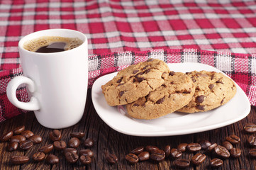 Cookies in plate and coffee cup