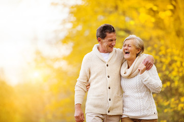 Active seniors walk in nature