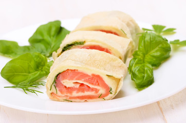 Lavash rolls with salmon, cheese and herbs