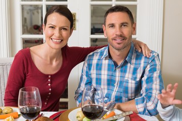 Cute couple smiling at camera