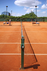 Playing tennis