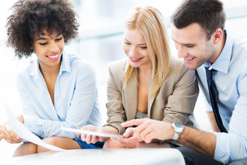 Young business people discussing in office