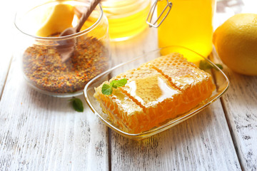 Fresh honey on wooden table