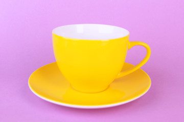 Colorful cup on color background