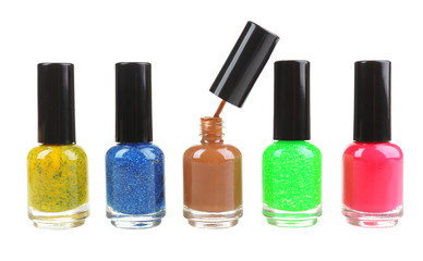 Colorful nail polishes isolated on white