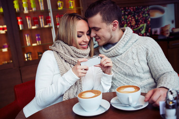 Couple in winter cafe