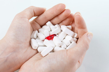 Pills in hand, close-up