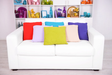 Modern interior design. White living room with sofa and