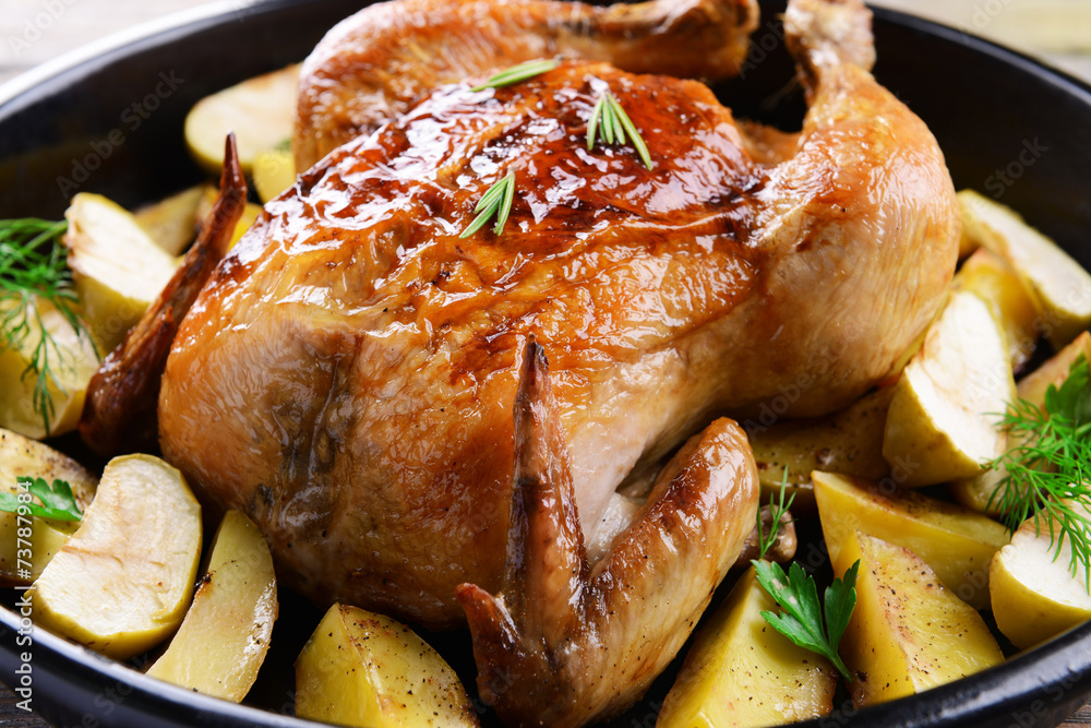 Canvas Prints delicious baked chicken on table close-up