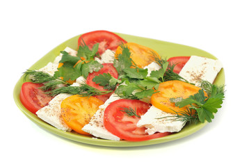 salad with tomatoes, feta cheese with parsley and dill