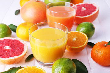 Naklejka na ściany i meble Juices and many citrus close-up