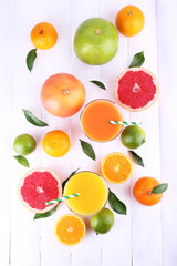 Juices and many citrus close-up