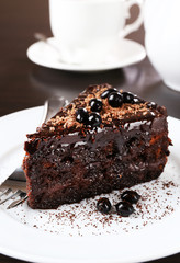 Yummy chocolate cake served on table, close-up