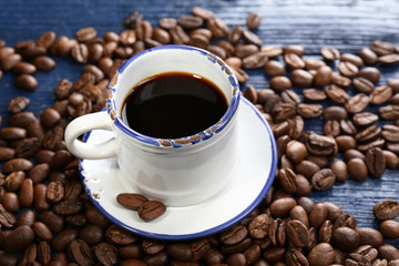 Cup of coffee on wooden table