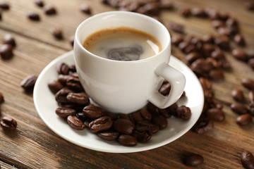 Cup of coffee on wooden table