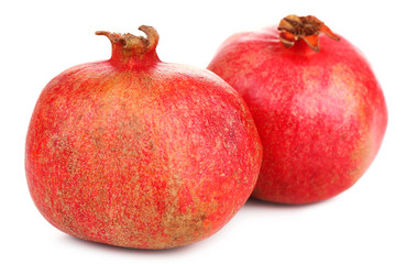 Juicy ripe pomegranates, isolated on white