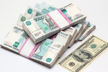 Hundred dollars and Russian to one thousand rouble banknotes