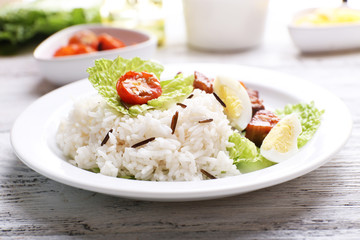 Boiled rice served on table, close-up