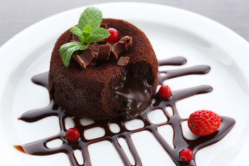 Hot chocolate pudding with fondant centre, close-up