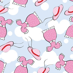 Seamless pattern with women's clothing in pink color