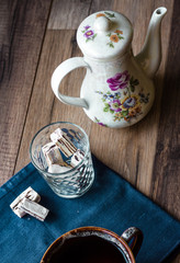 nougat candy in a glass and tea, blue napkin