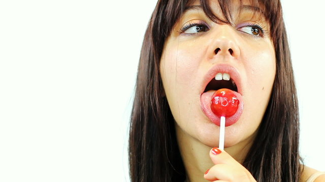 Licking sweet sugar candy