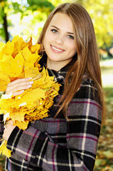 happy girl in the autumn park