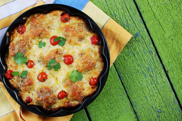 casserole with meatballs and cheese