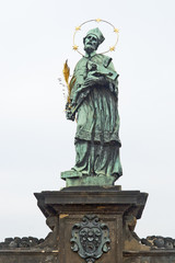 Fototapeta premium John of Nepomuk statue on Charles bridge in Prague