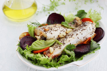 marine white fish baked with vegetables