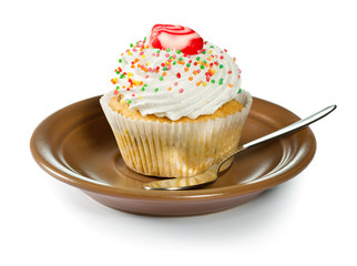 Cupcake on brown plate