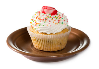 Cupcake on brown plate