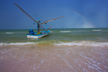 rainbow over huahin beach thailand