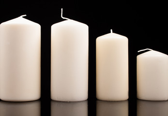 Christmas candles on a black background