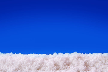 Blue  christmas background and white snow. 
