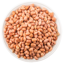 Peanut or ground nut in white bowl over white background