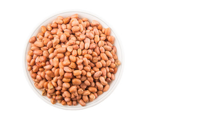 Peanut or ground nut in white bowl over white background