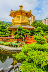 Gold Chinese pavilion at the park of Hong Kong