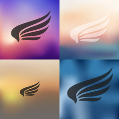 wing icon on blurred background
