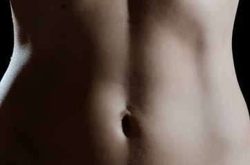 Stomach of young caucasian woman