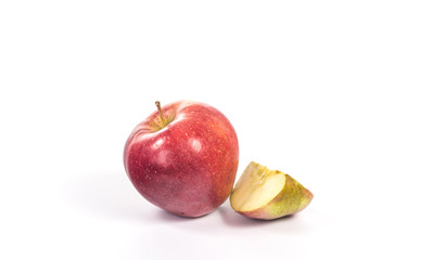 quarter of an apple next to a whole apple