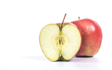 half an apple next to a whole apple