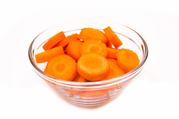 Fototapeta na wymiar Carrot slices on bowl on white background
