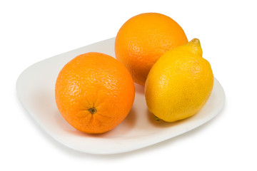 lemon and orange on a plate