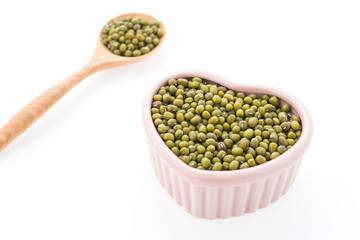 Green mung beans isolated on white background