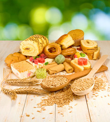 Fototapeta premium different cookies on the table on a green background