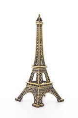 Fototapeta na wymiar Eiffel Tower toy isolated on white background