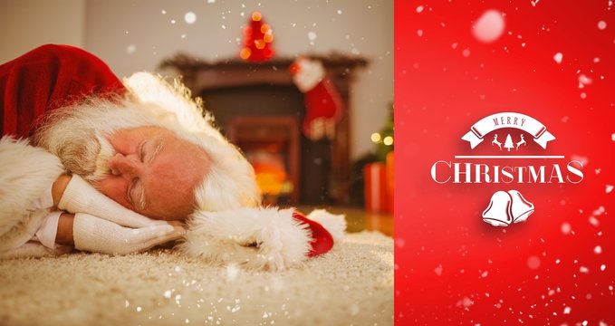 Composite image of santa claus resting on the rug