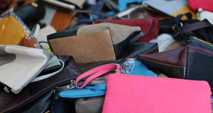 cases and leather bags of various sizes on sale in the market