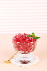 Closeup of cherry granita in glass bowl,